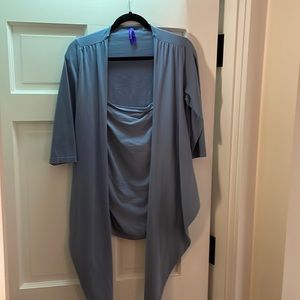 Seraphine baby wearing shirt. Excellent condition.